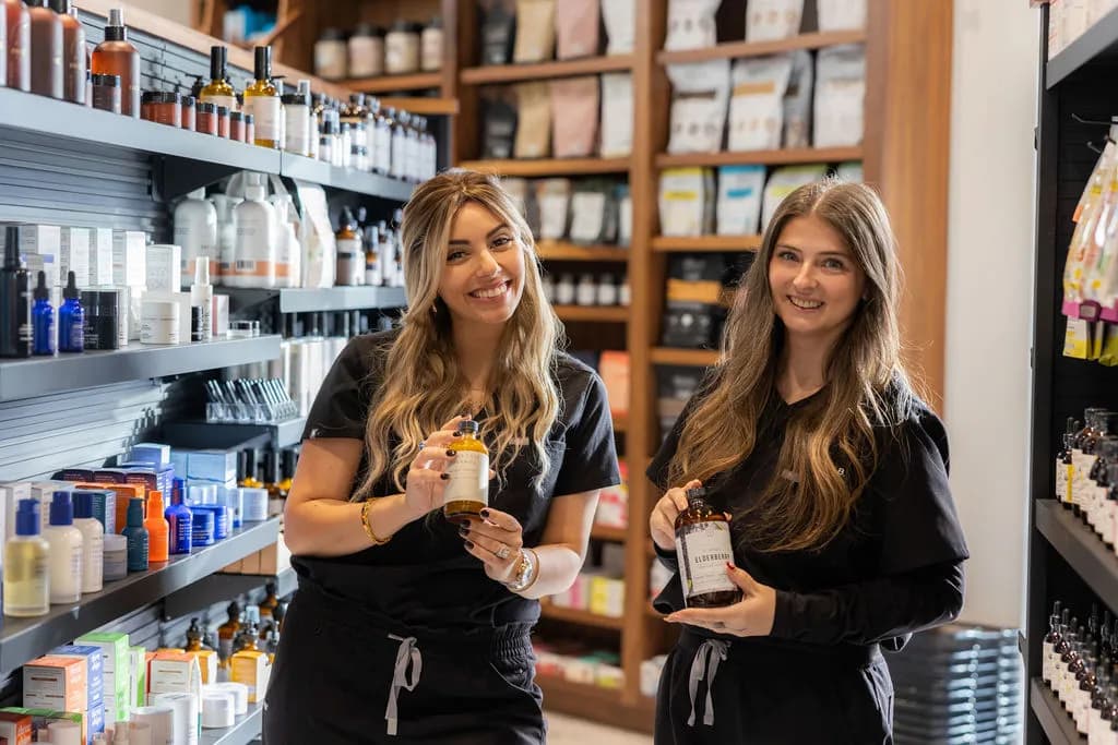 Two People & Pets Pharmacy pharmacists in the store